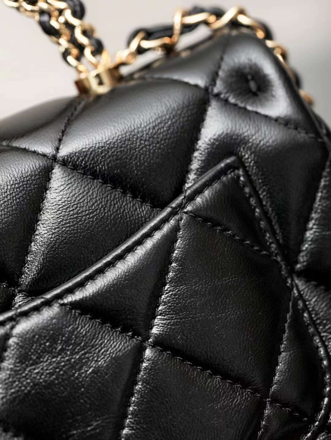 CHANEL mouth cover with handle