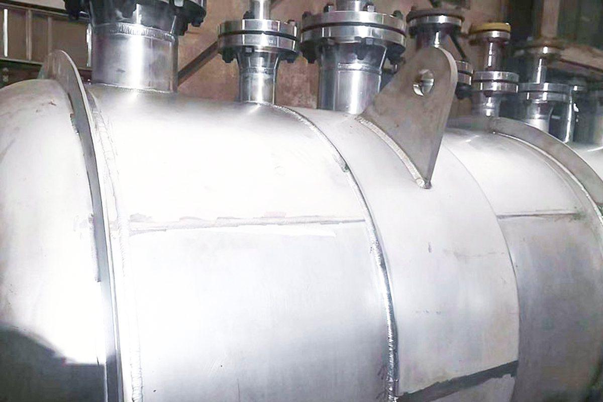 A pressure vessel shall be defined as a container simultaneously meeting the following three criteri