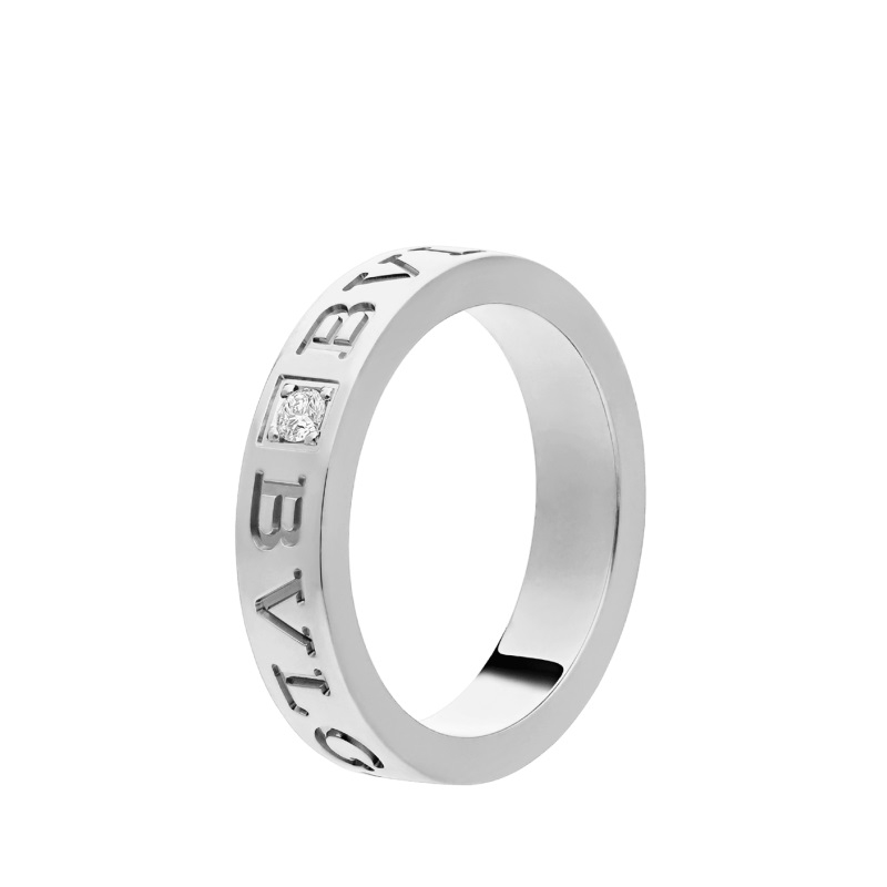 18 KT ROSE GOLD WHITE GOLD RING SET WITH A DIAMOND