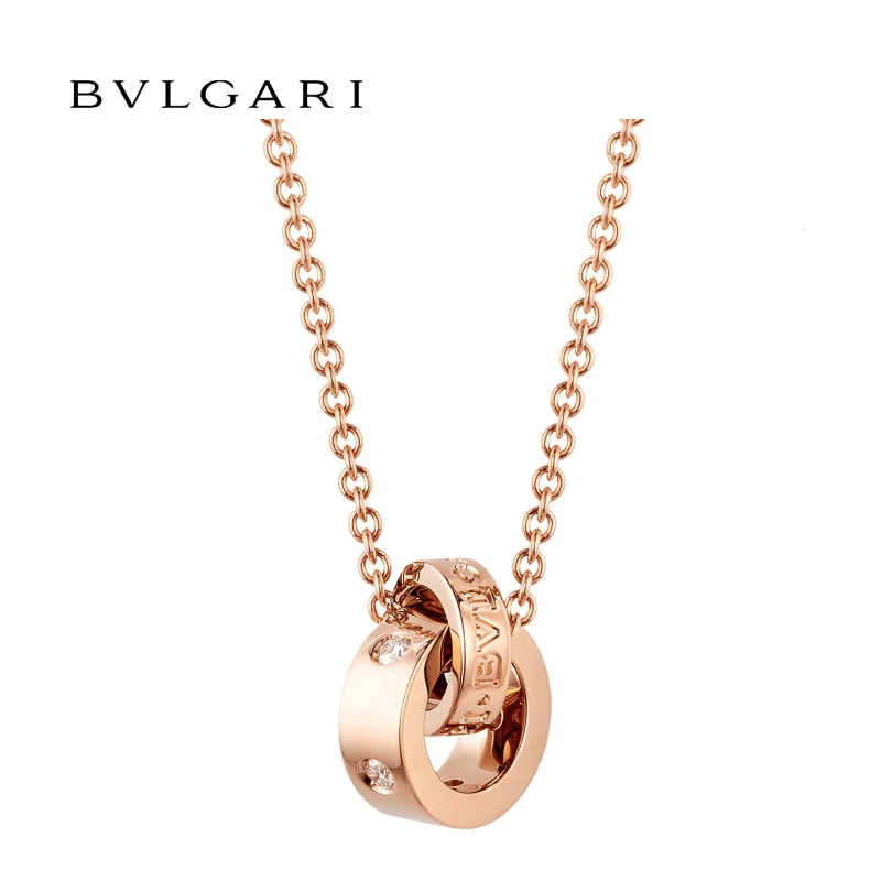 18 KT ROSE GOLD PENDANT SET WITH FIVE DIAMONDS