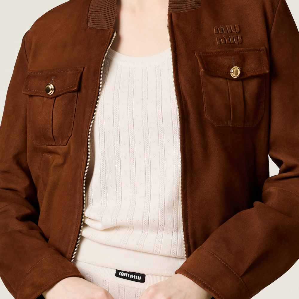 Miu Miu bags: Wander Matelassé mini Hobo bag in soft lambskin leather, small crescent bag.