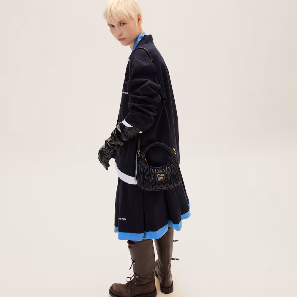 Miu Miu bags: Wander Matelassé mini Hobo bag in soft lambskin leather, small crescent bag.