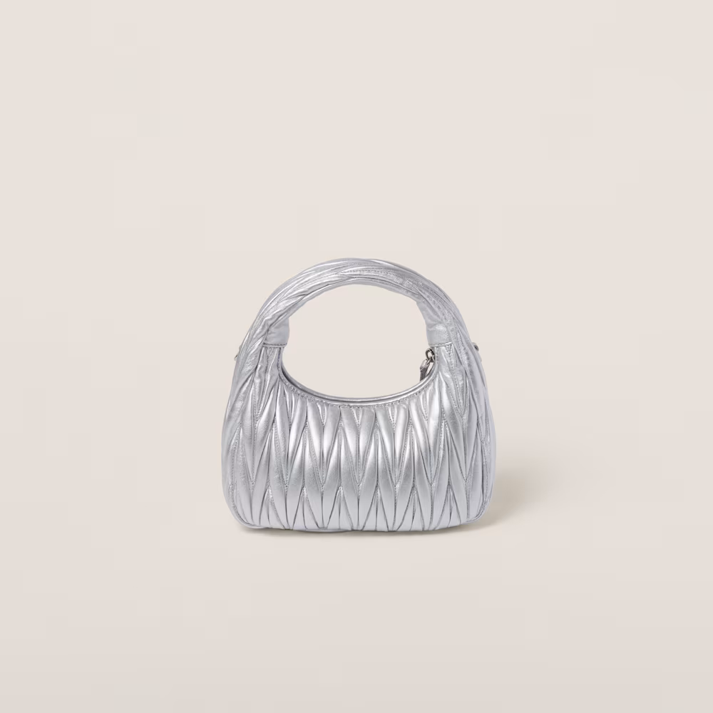 Miu Miu bags: Wander Matelassé mini Hobo bag in soft lambskin leather, small crescent bag.