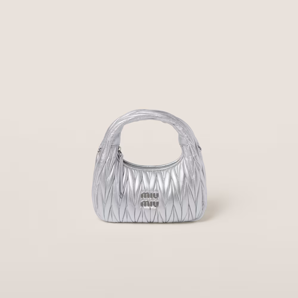 Miu Miu bags: Wander Matelassé mini Hobo bag in soft lambskin leather, small crescent bag.