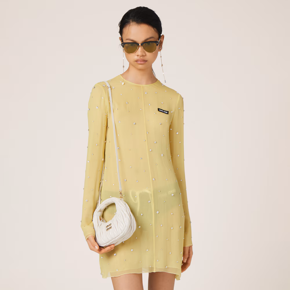 Miu Miu bags: Wander Matelassé mini Hobo bag in soft lambskin leather, small crescent bag.