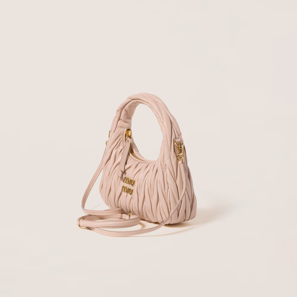 Miu Miu bags: Wander Matelassé mini Hobo bag in soft lambskin leather, small crescent bag.