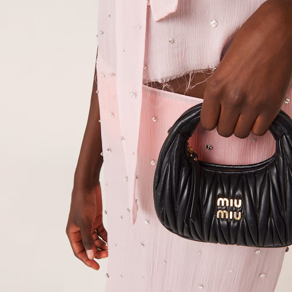 Miu Miu bags: Wander Matelassé mini Hobo bag in soft lambskin leather, small crescent bag.