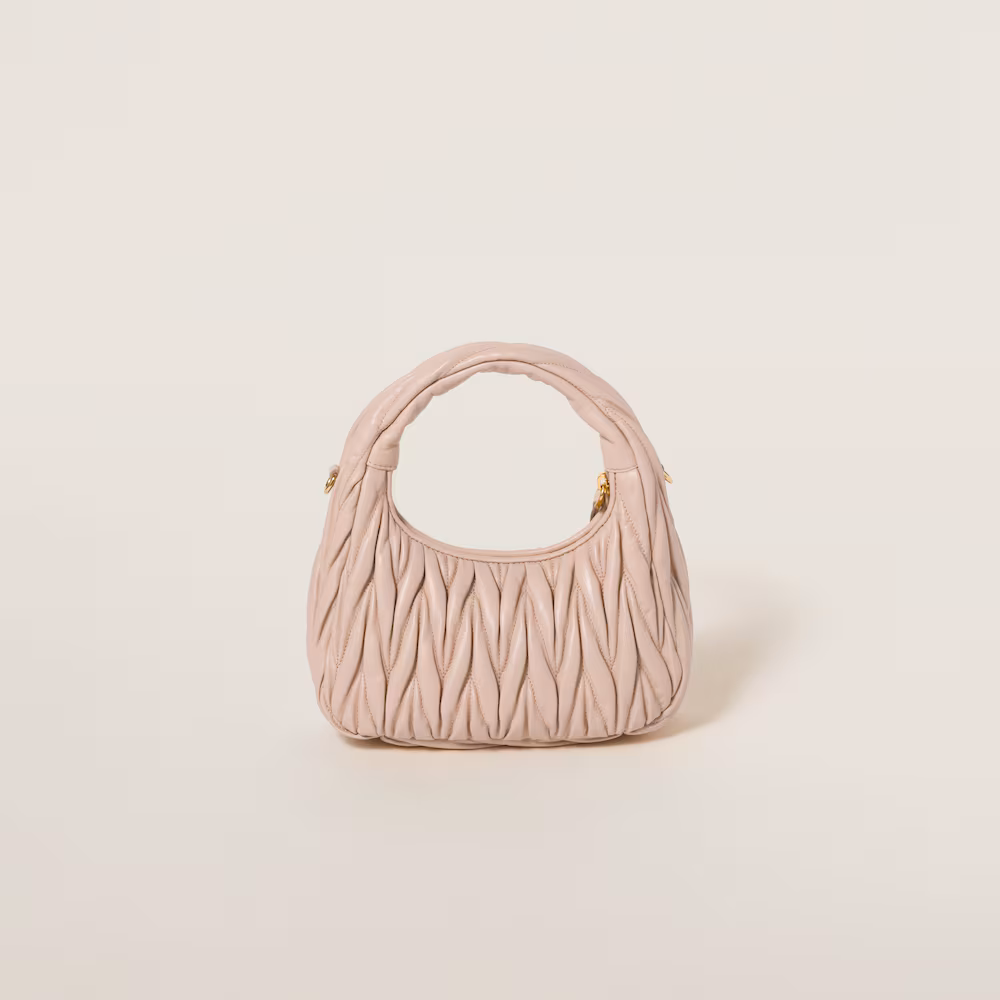 Miu Miu bags: Wander Matelassé mini Hobo bag in soft lambskin leather, small crescent bag.