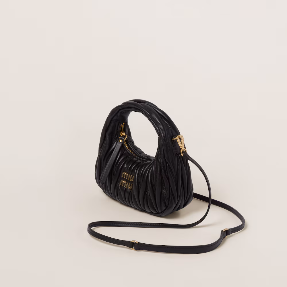 Miu Miu bags: Wander Matelassé mini Hobo bag in soft lambskin leather, small crescent bag.