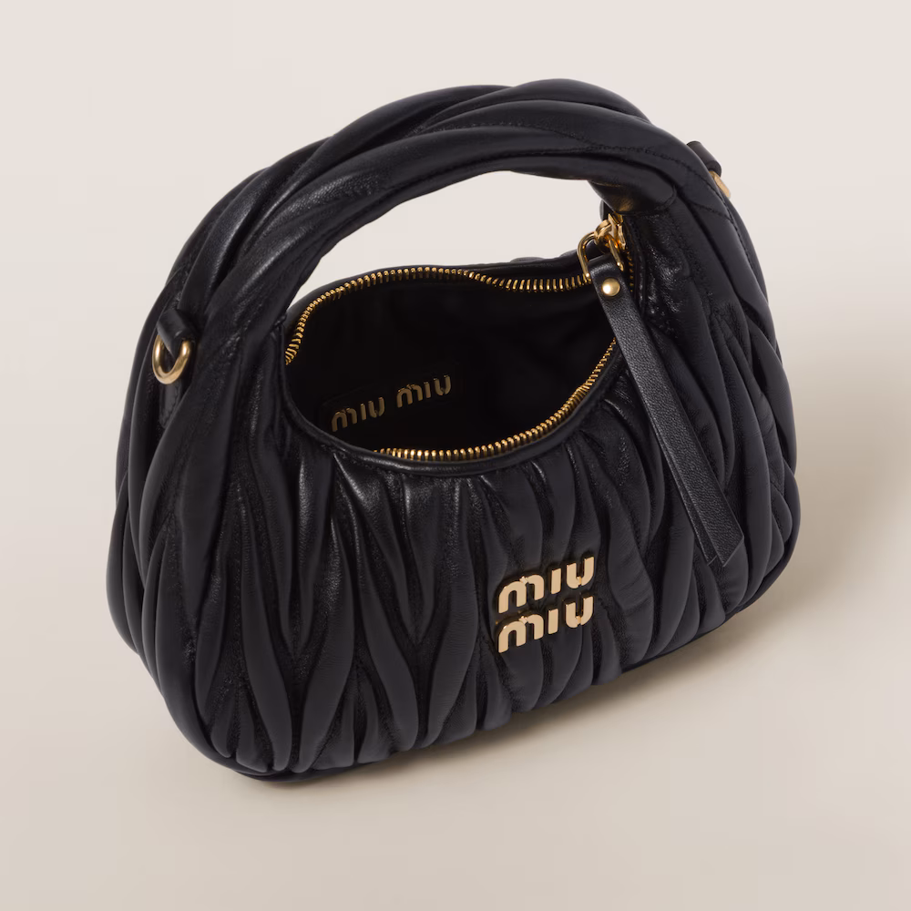 Miu Miu bags: Wander Matelassé mini Hobo bag in soft lambskin leather, small crescent bag.