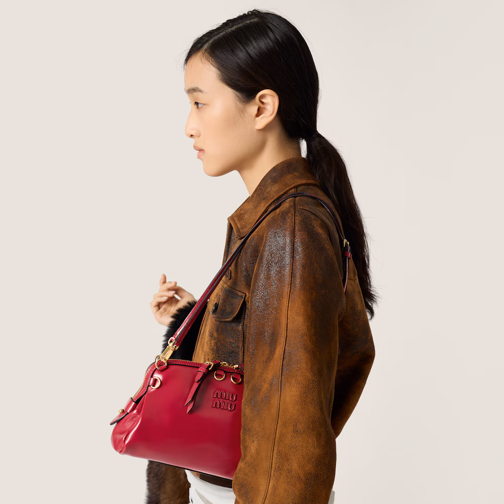 Miu Miu leather clutch bag