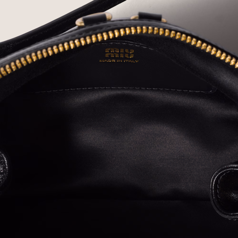 Miu Miu leather clutch bag