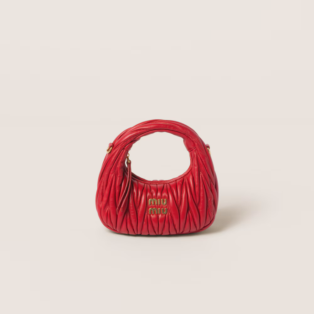 Miu Miu bags: Wander Matelassé mini Hobo bag in soft lambskin leather, small crescent bag.