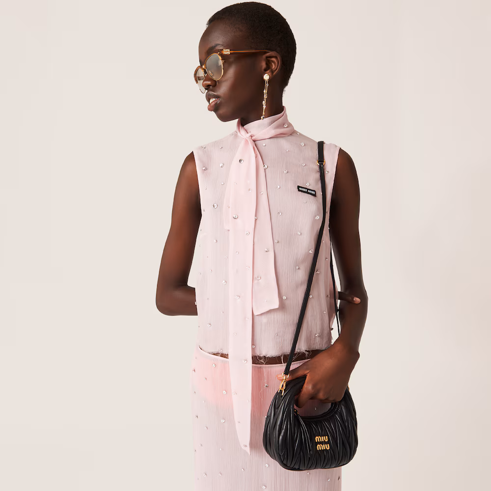 Miu Miu bags: Wander Matelassé mini Hobo bag in soft lambskin leather, small crescent bag.