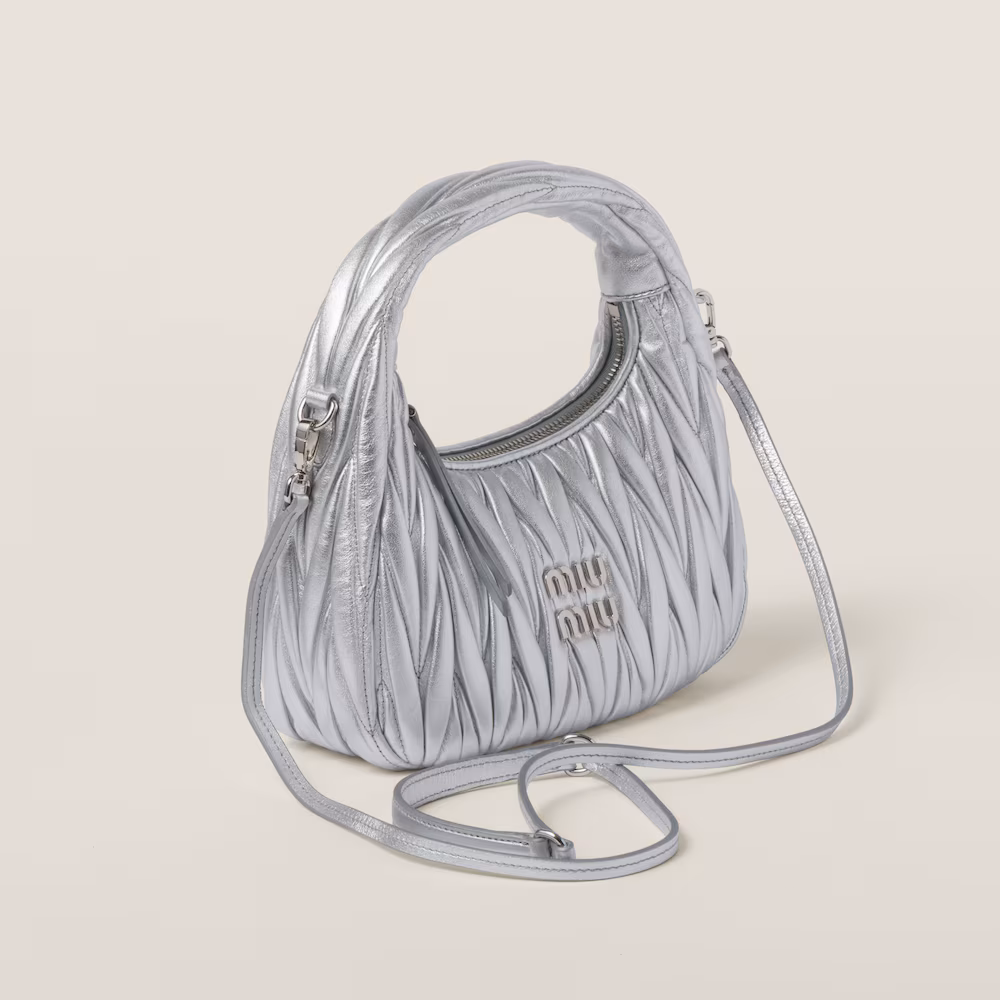 Miu Miu bags: Wander Matelassé mini Hobo bag in soft lambskin leather, small crescent bag.