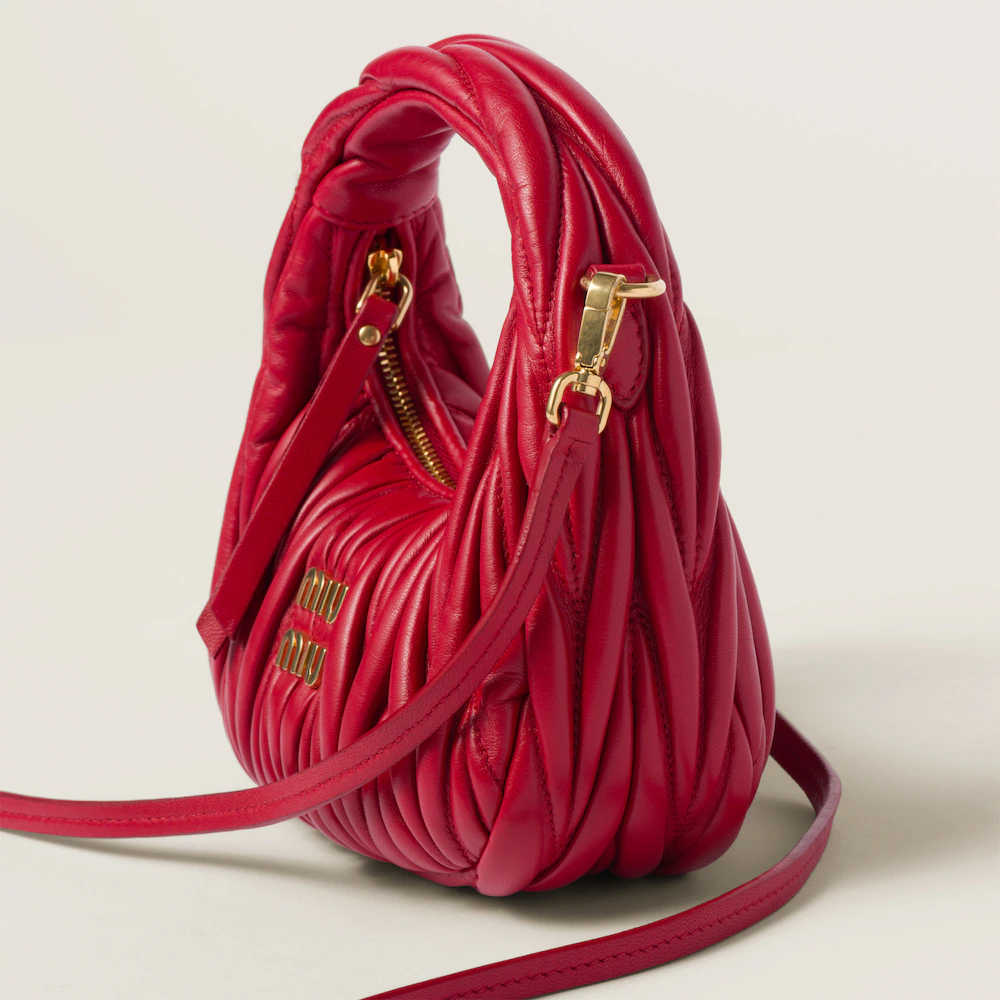 Miu Miu bags: Wander Matelassé mini Hobo bag in soft lambskin leather, small crescent bag.