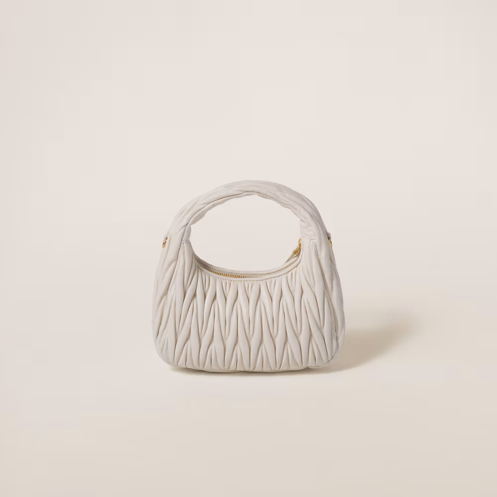Miu Miu bags: Wander Matelassé mini Hobo bag in soft lambskin leather, small crescent bag.