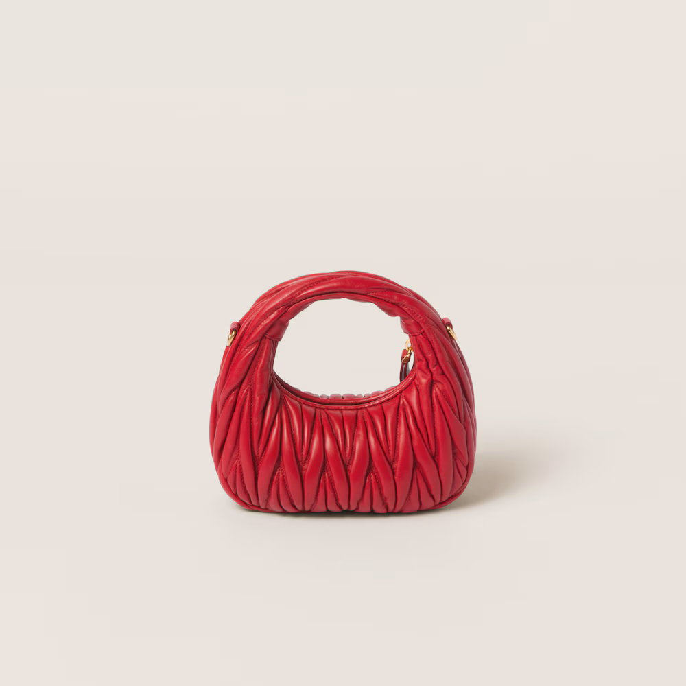 Miu Miu bags: Wander Matelassé mini Hobo bag in soft lambskin leather, small crescent bag.