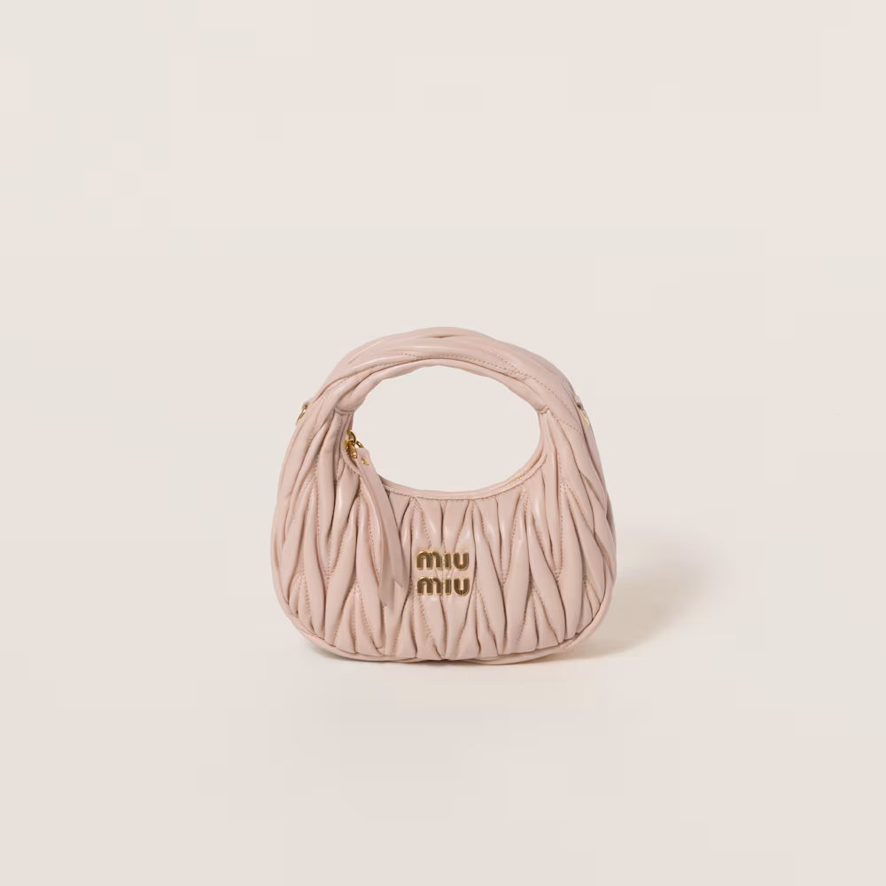 Miu Miu bags: Wander Matelassé mini Hobo bag in soft lambskin leather, small crescent bag.