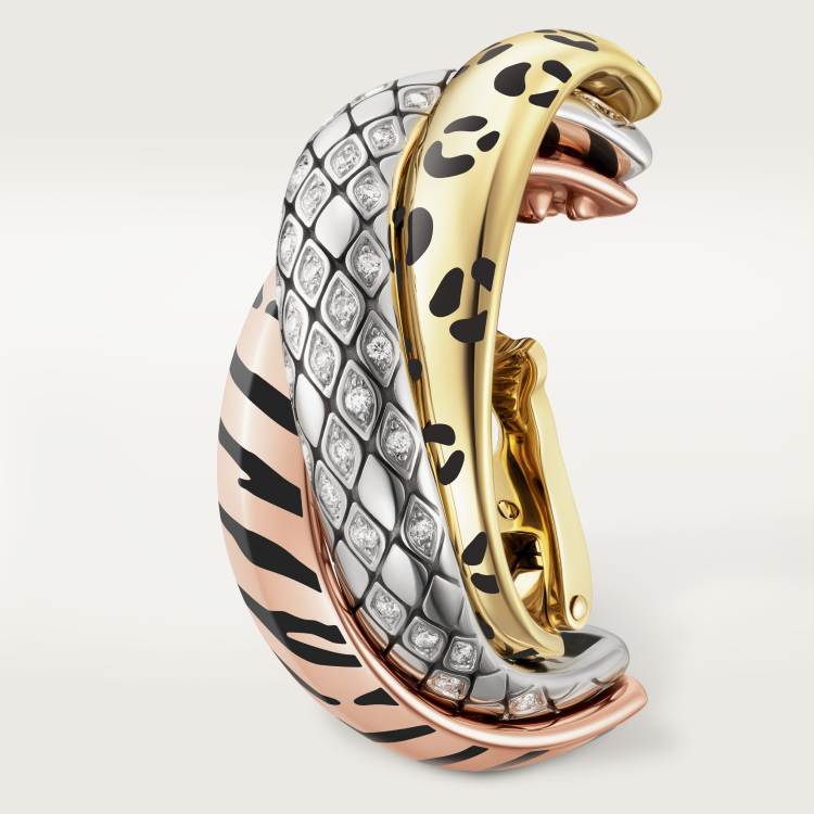 Cartier Trinity single earring, lacquer finish, half-paved with diamonds.