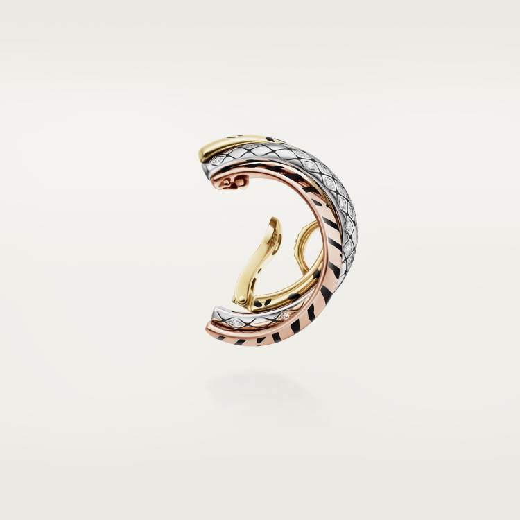 Cartier Trinity single earring, lacquer finish, half-paved with diamonds.