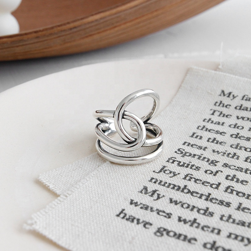 Women's Arrow Knot Inspiration Adjustable Stackable Thumb Open Ring - Stainless Steel Band