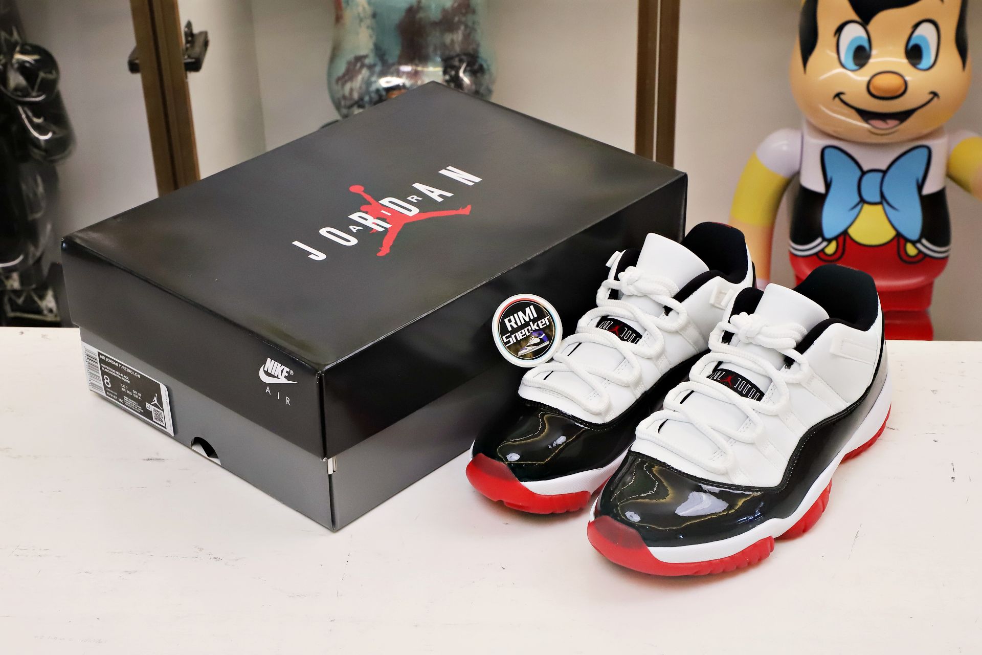 AIR JORDAN 11 LOW WHITE BRED