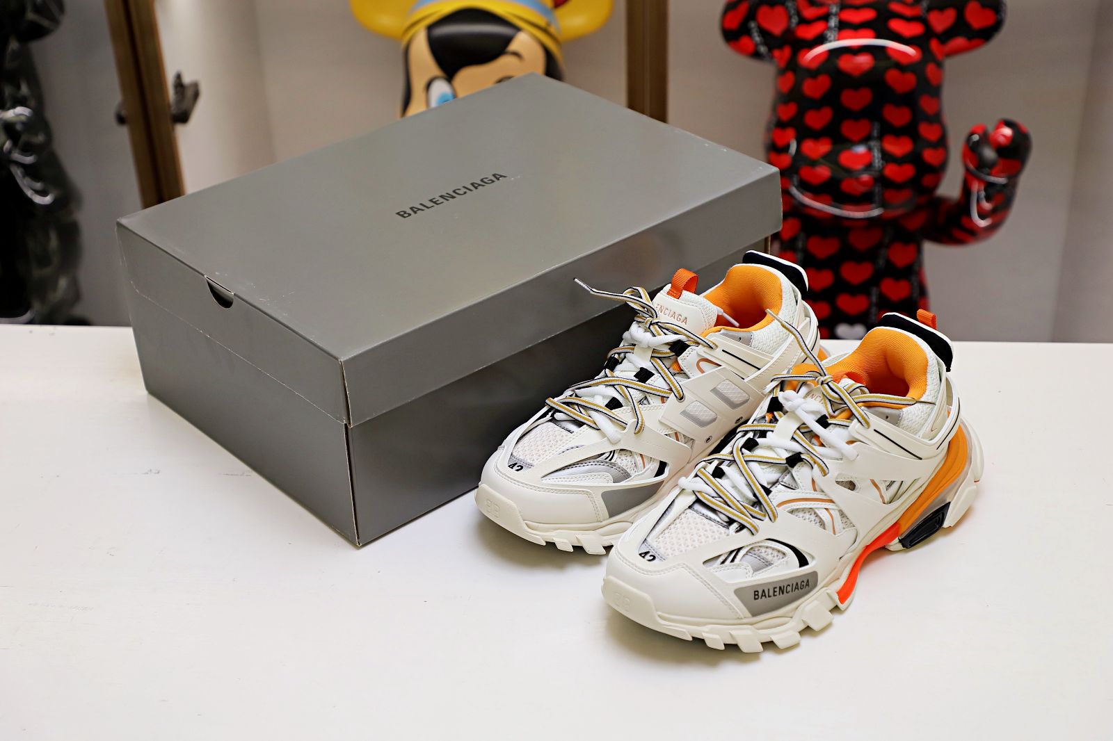 Balenciaga all sizes still in stock! Please contact customer service on iMessage/WhatsApp to purchase! TRACK TRAINER WHITE ORANGE