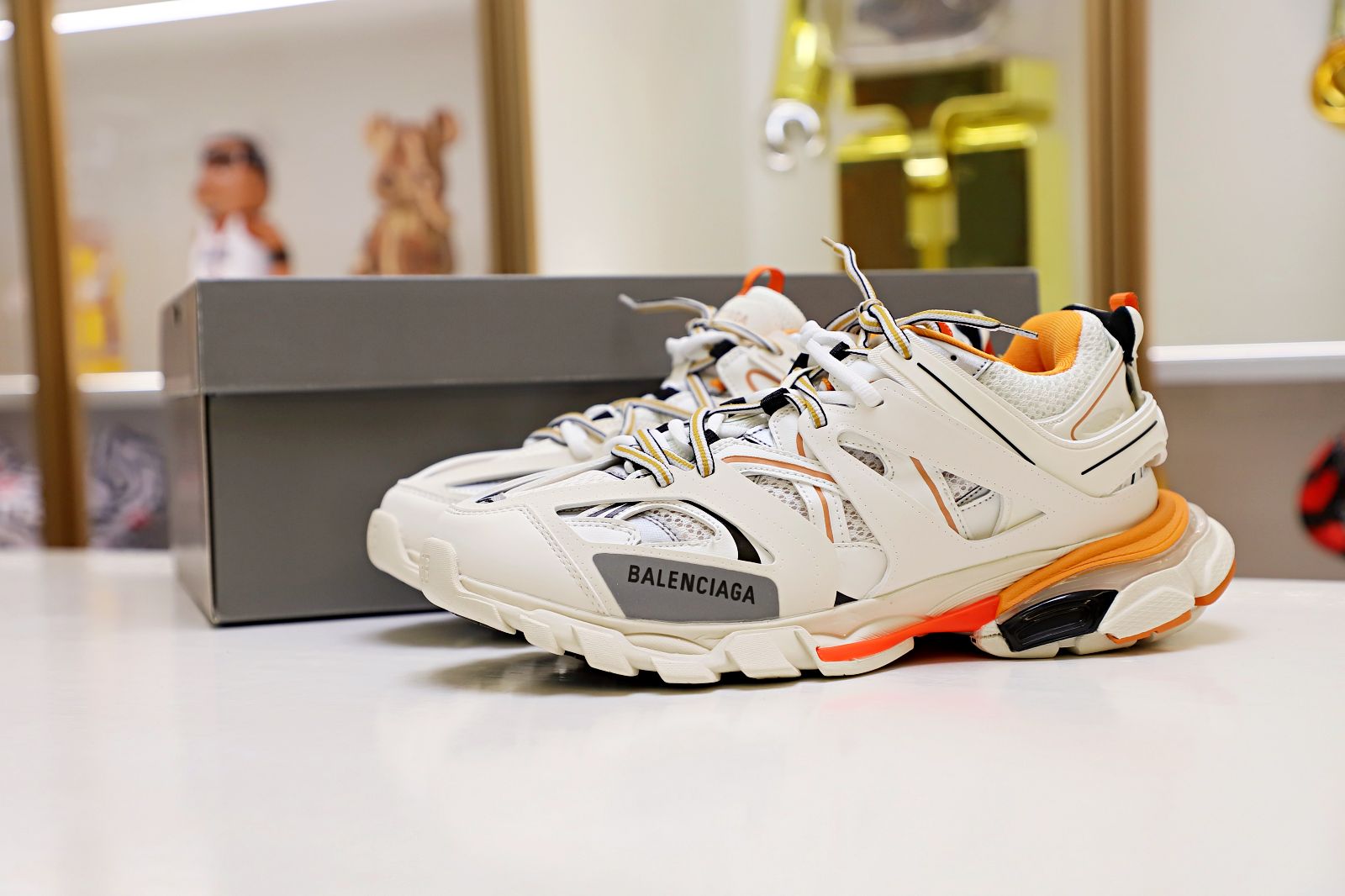 Balenciaga all sizes still in stock! Please contact customer service on iMessage/WhatsApp to purchase! TRACK TRAINER WHITE ORANGE