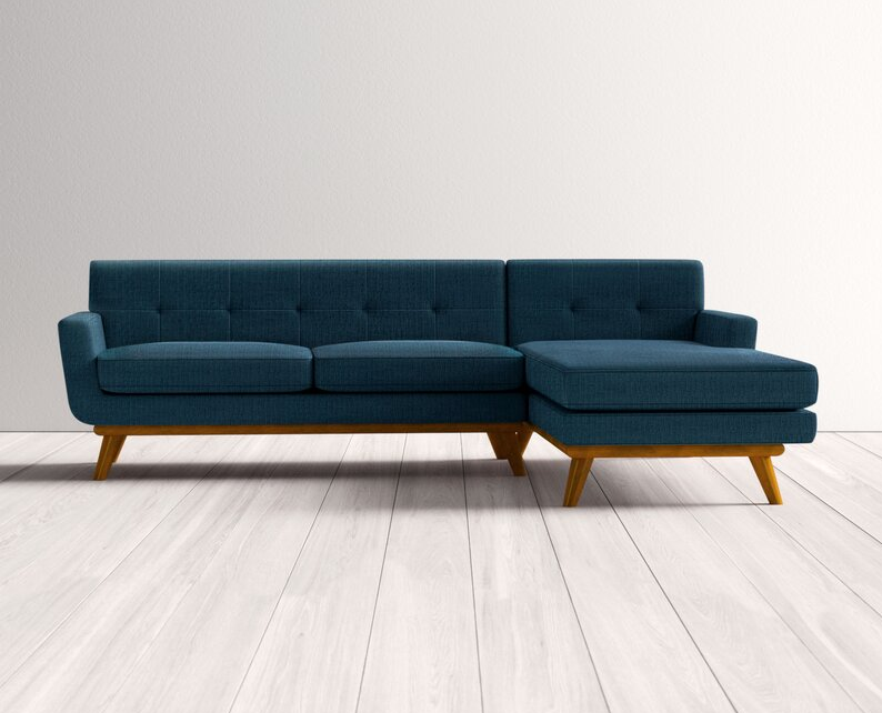 Giuliana 104″ Wide Faux Leather Reversible Sofa & Chaise with Ottoman