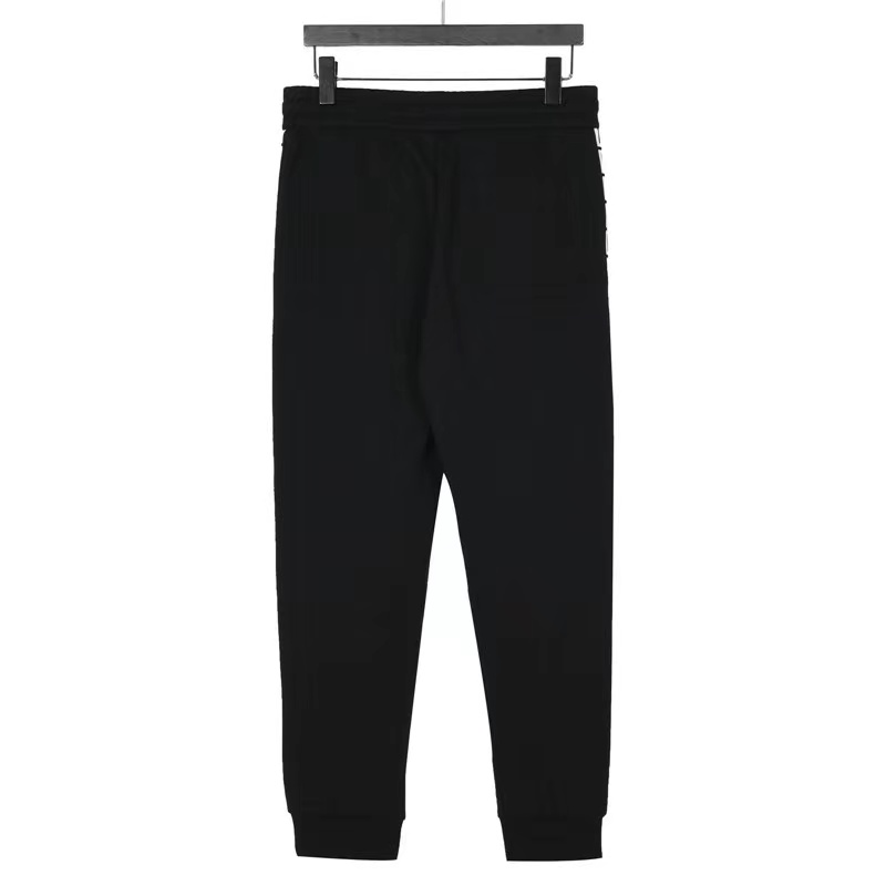 Givenchy web letter patchwork logo trousers