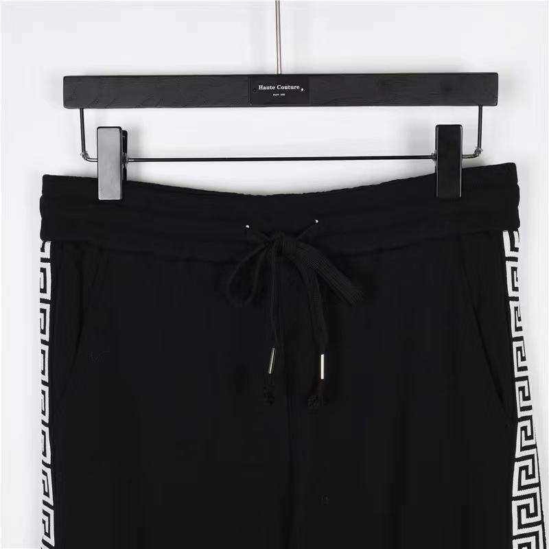 Givenchy web letter patchwork logo trousers