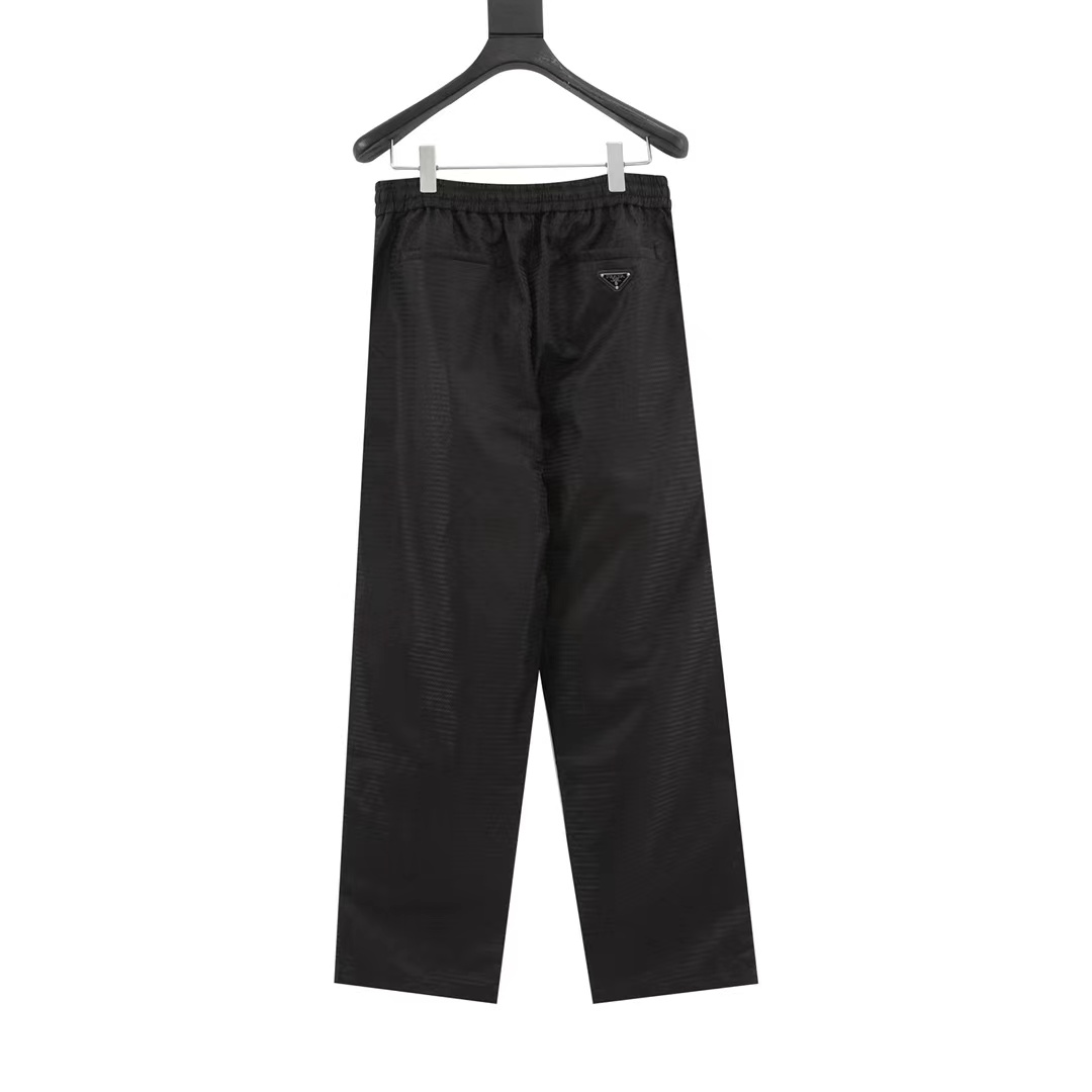 Prada nylon woven dark print trousers