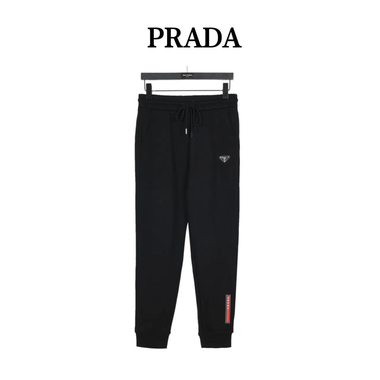 Prada 23Fw triangle logo trousers