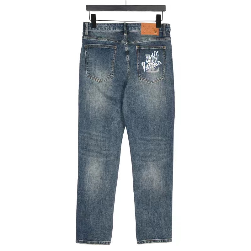 Louis Vuitton jeans with graffiti lettering on the back