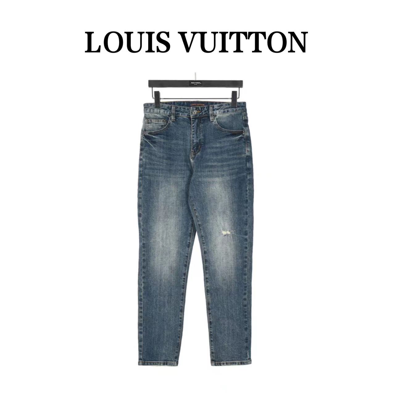Louis Vuitton jeans with graffiti lettering on the back