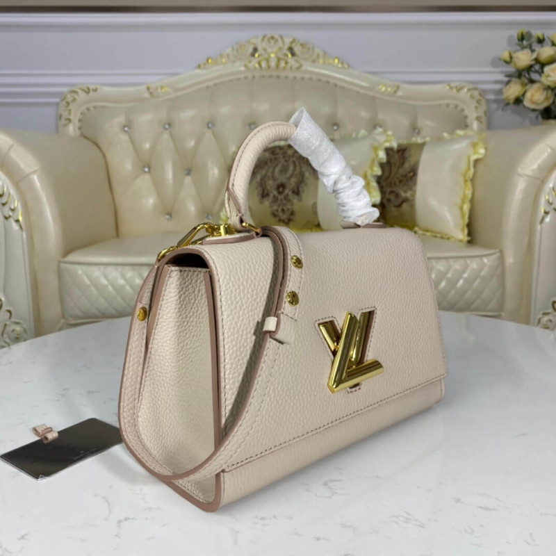 Eluxury Company - Introducing the Twist One Handle PM handbag in Taurillon  leather. Its striking shape, elegant top handle, and iconic LV twist-lock  make it a sophisticated everyday bag. In addition to