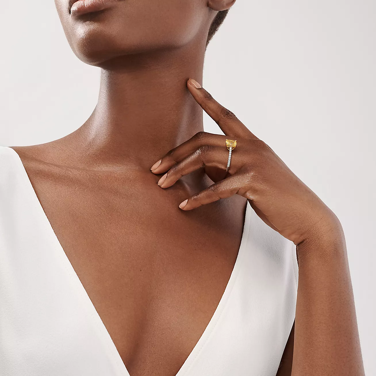 Novo® Yellow Diamond Engagement Ring with a Pavé Diamond Platinum Band