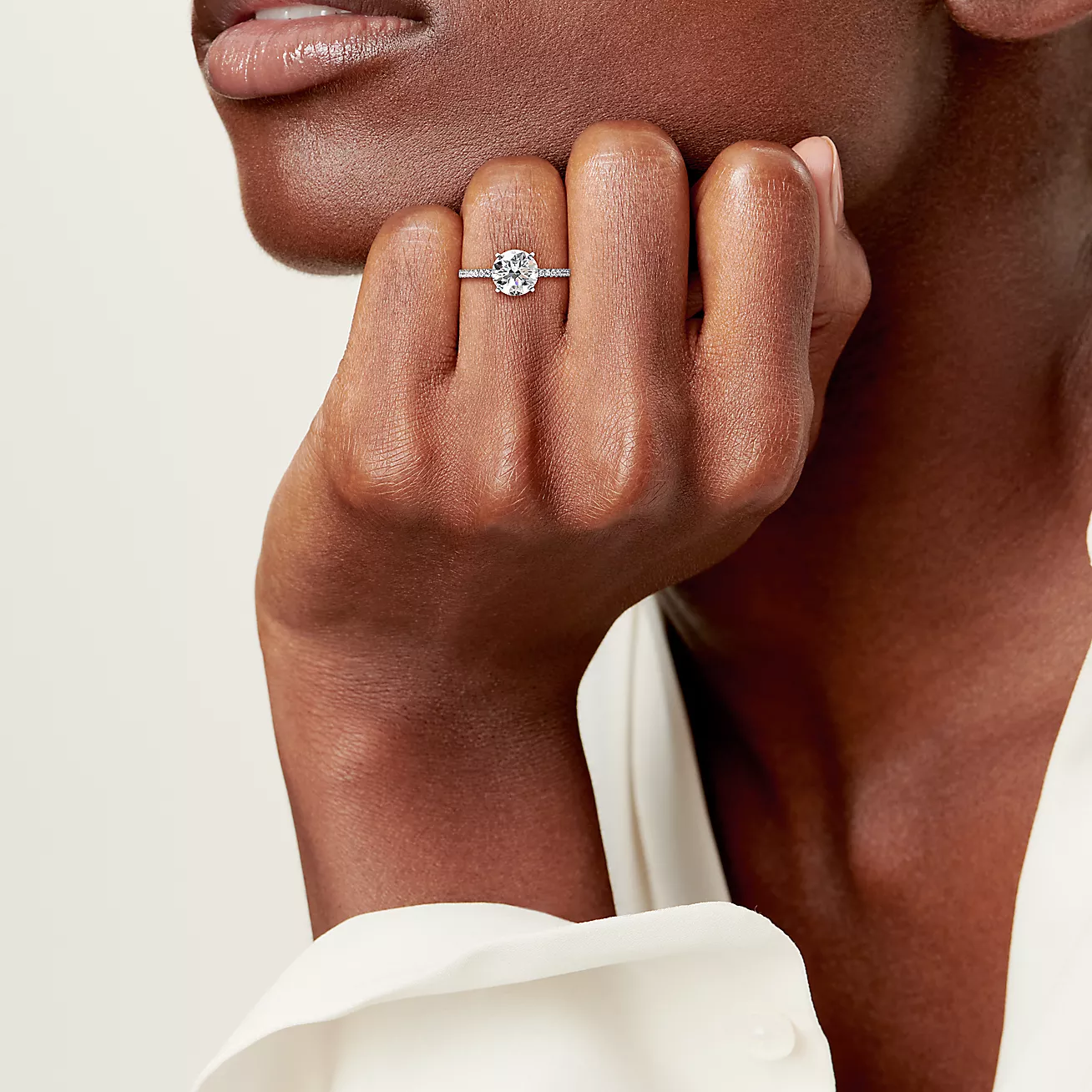 Engagement Ring with a Round Brilliant Diamond and a Platinum Diamond Band