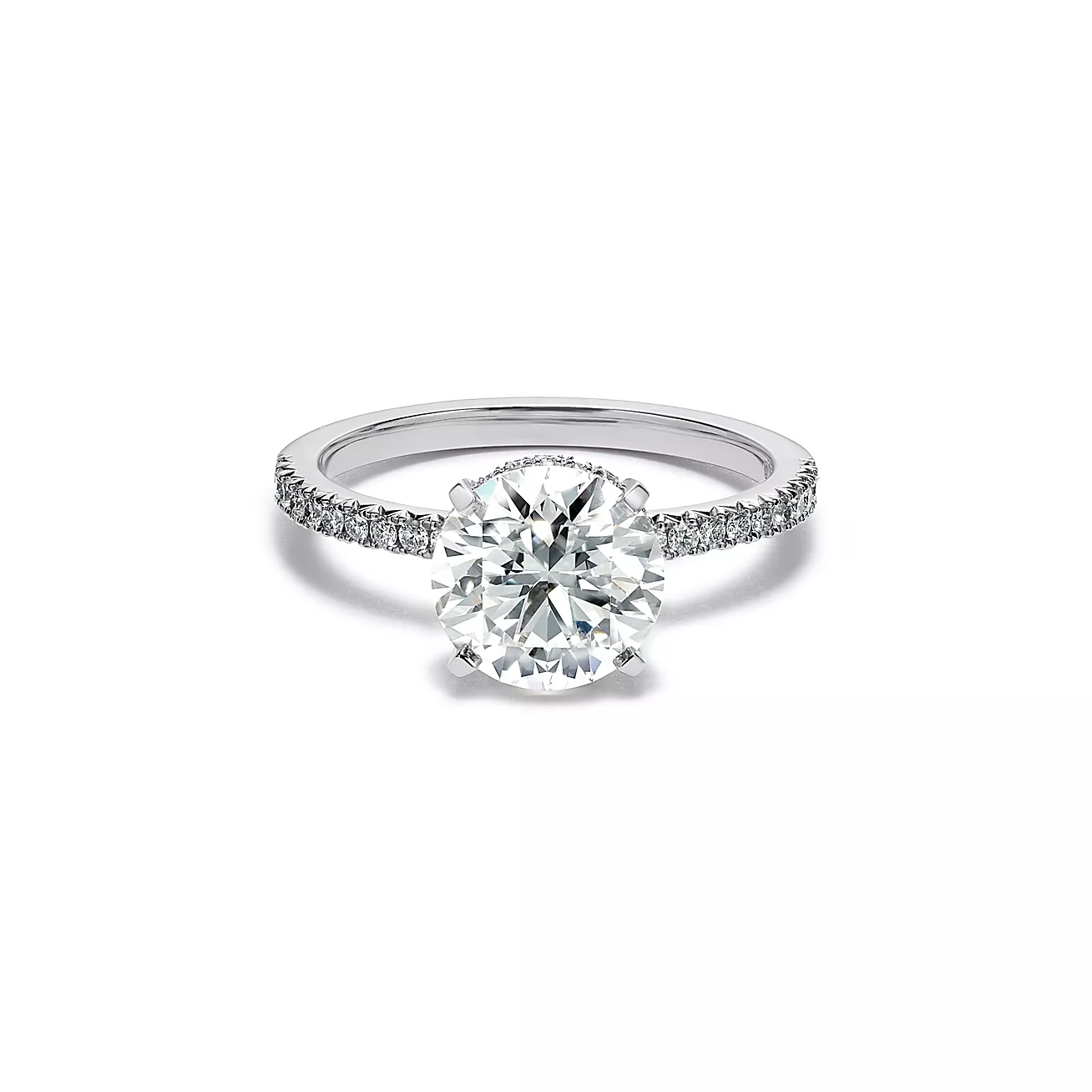 Engagement Ring with a Round Brilliant Diamond and a Platinum Diamond Band