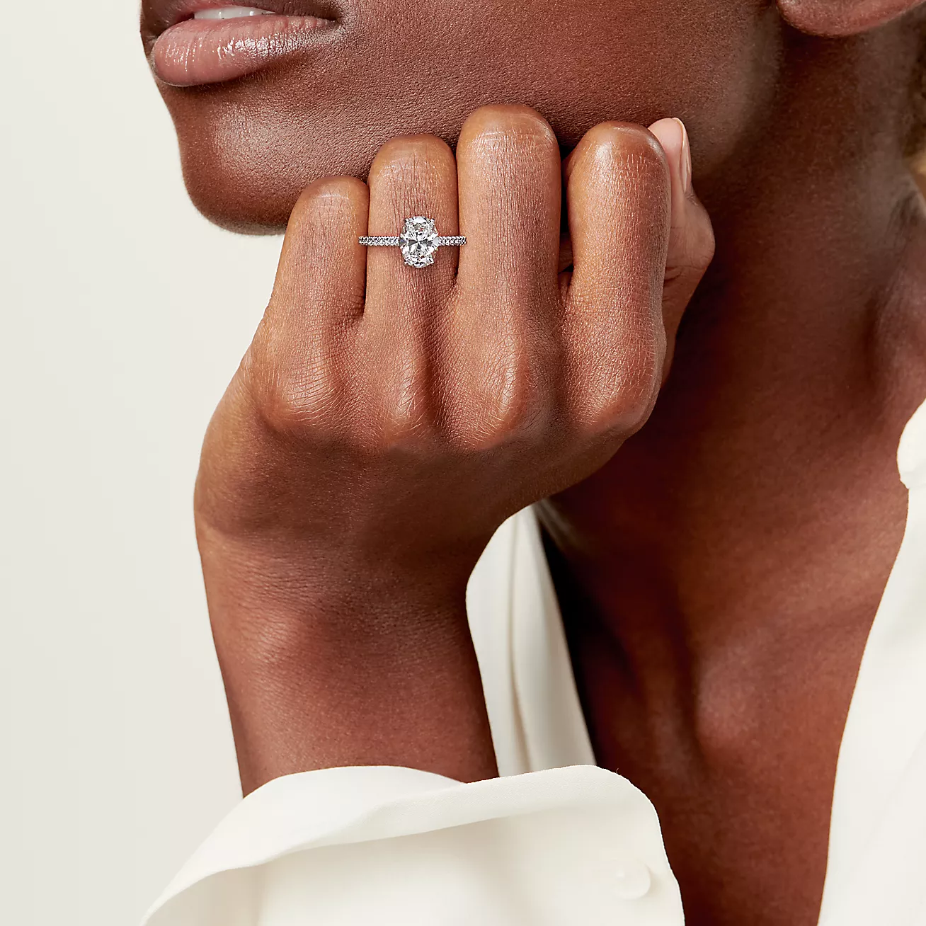 Novo® Oval Brilliant Engagement Ring with a Pavé Diamond Platinum Band