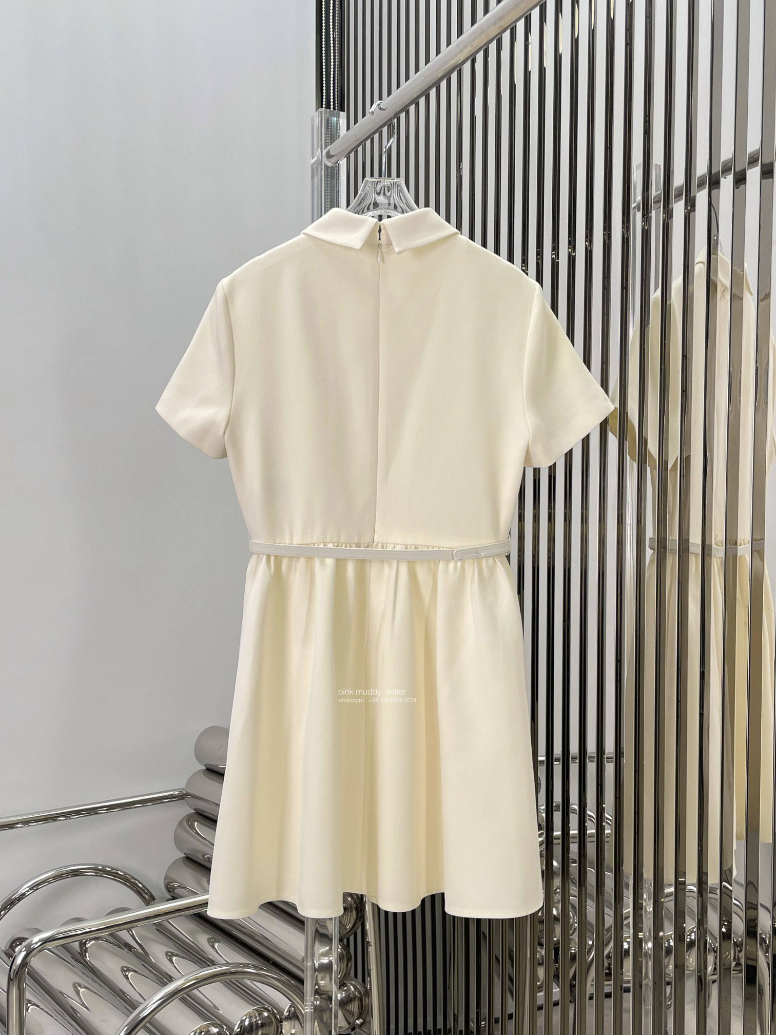 FITTED DRESS WITH 'CD' BUTTONS