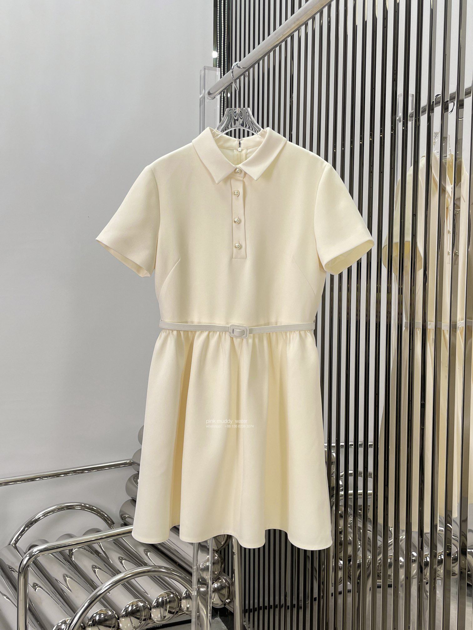 FITTED DRESS WITH 'CD' BUTTONS