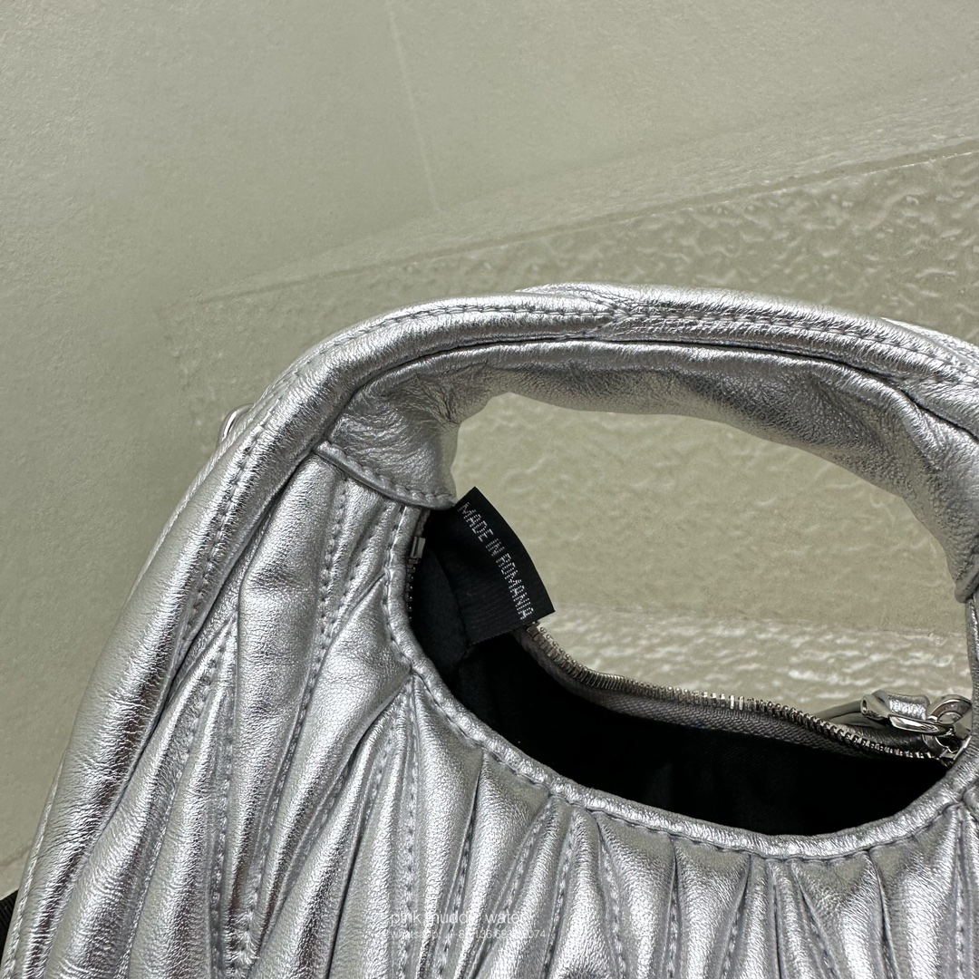 Wander leather detail shearling crescent bag