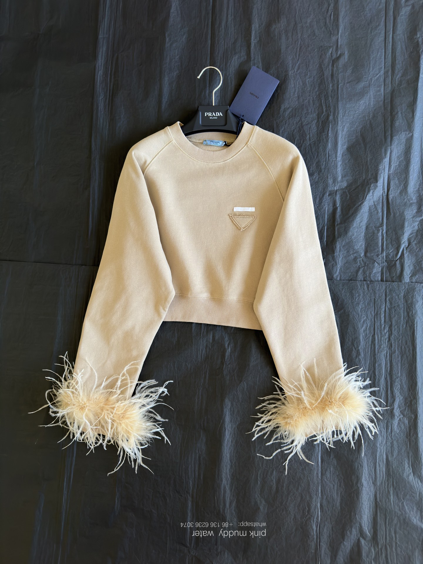 Crew-neck sweatshirt with feather trim