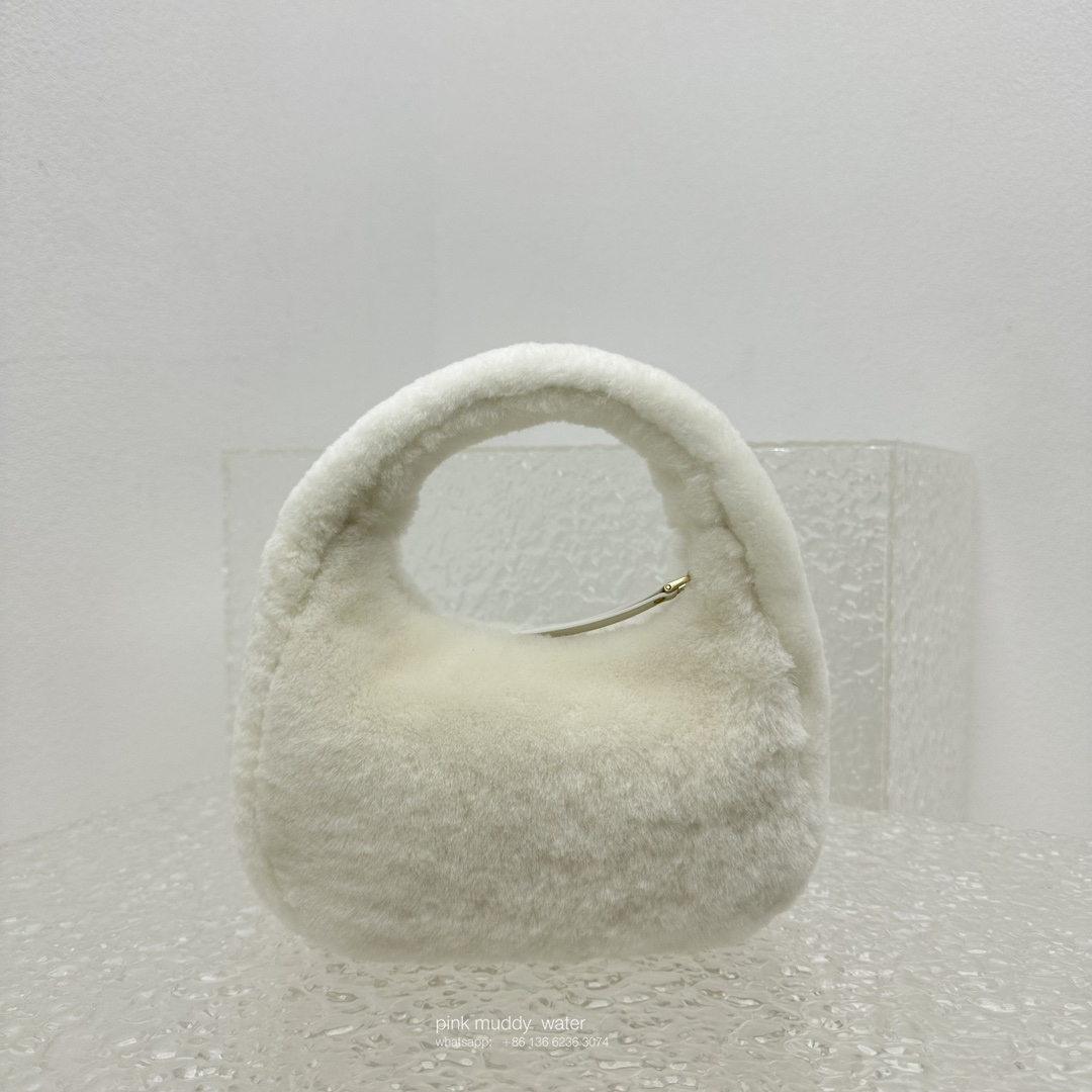 Wander leather detail shearling crescent bag