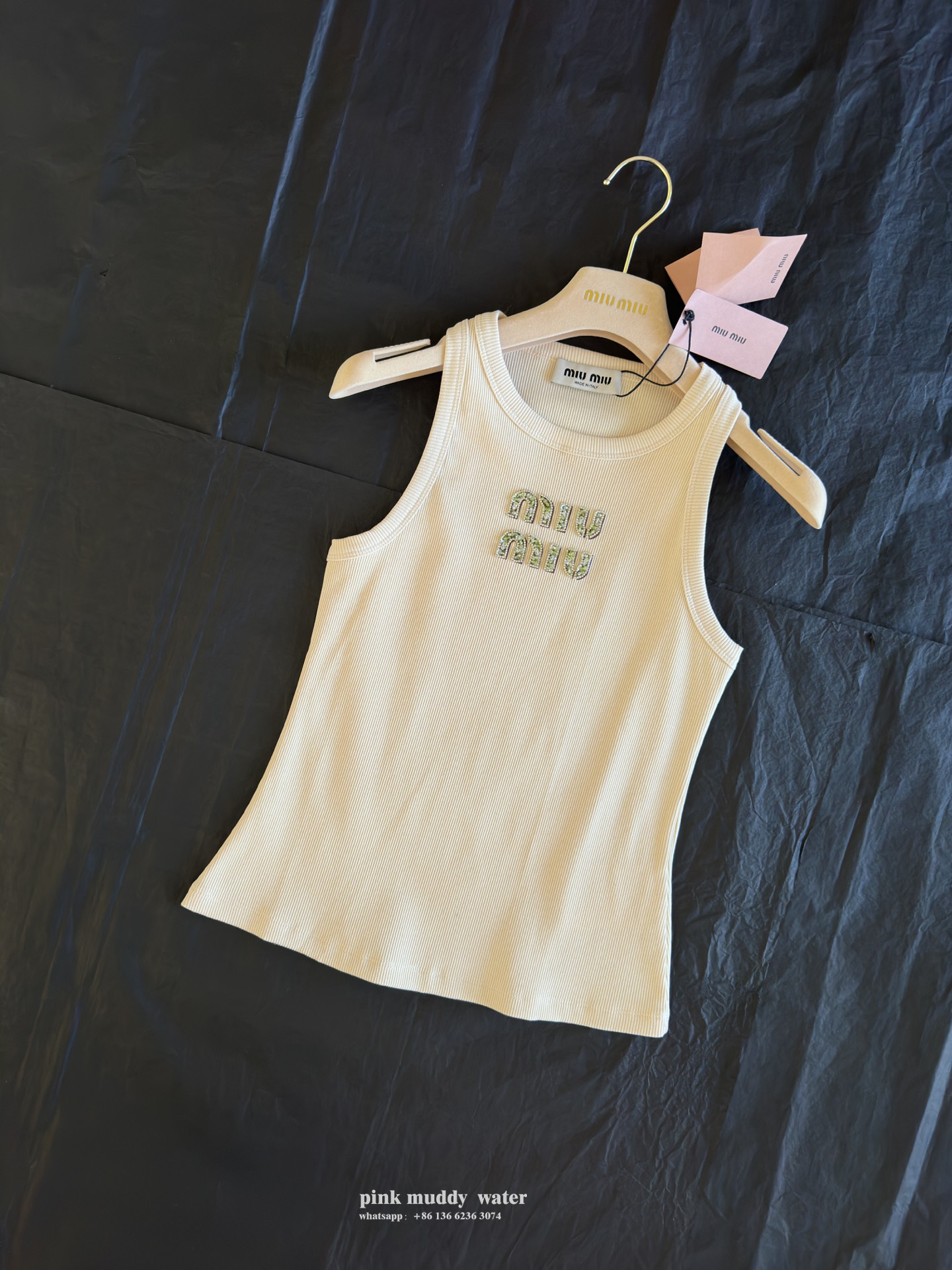 Rib knit top with embroidered logo