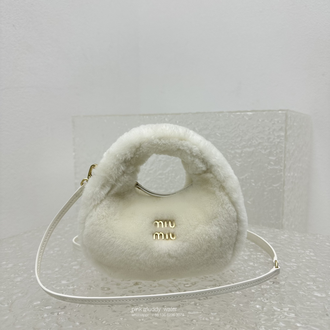 Wander leather detail shearling crescent bag