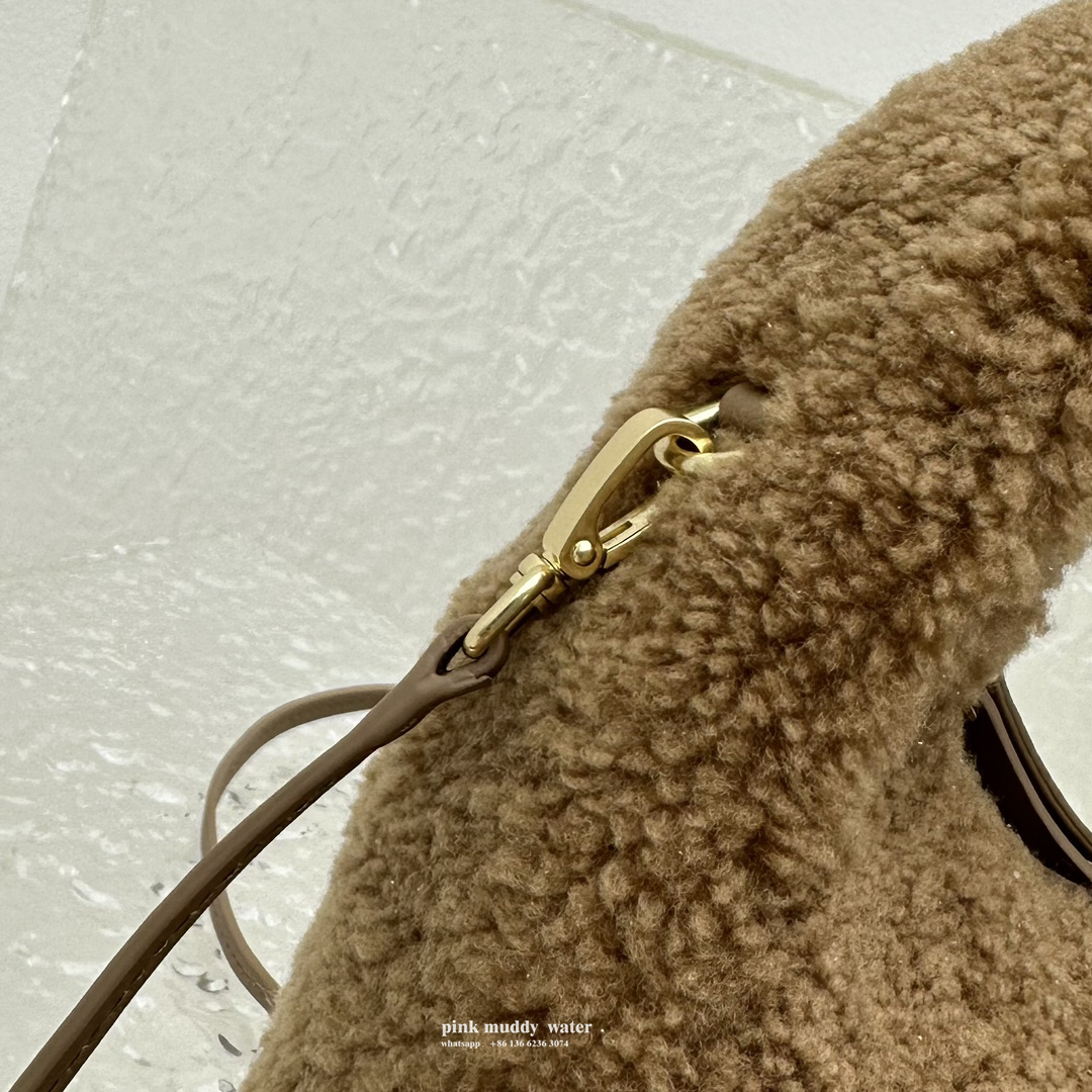 Wander leather detail shearling crescent bag