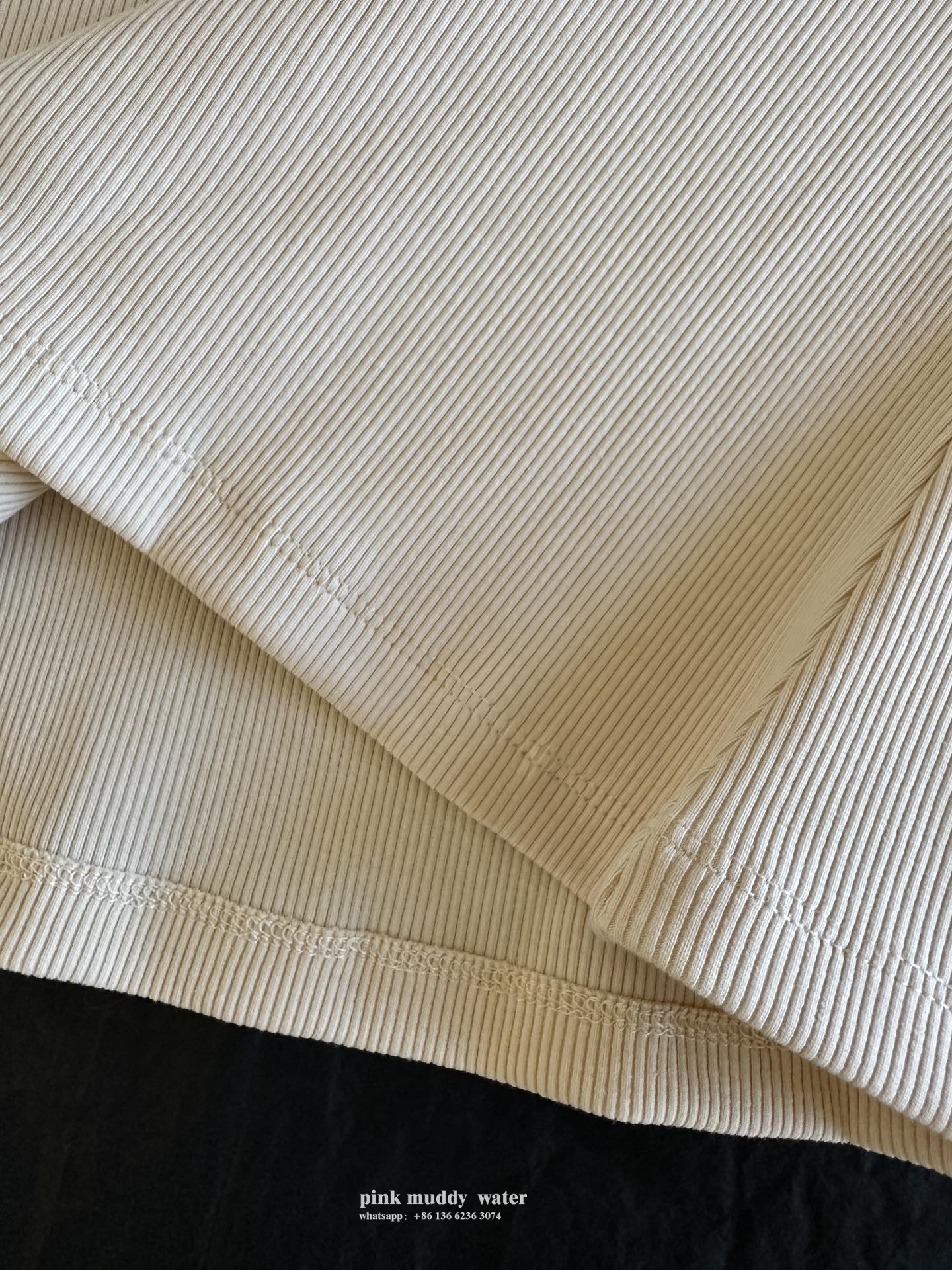 Rib knit top with embroidered logo